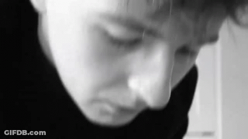 Black And White Person With Eyes Closed GIF