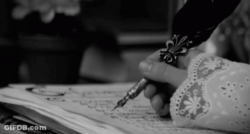 Black And White Person Writing With Pen GIF