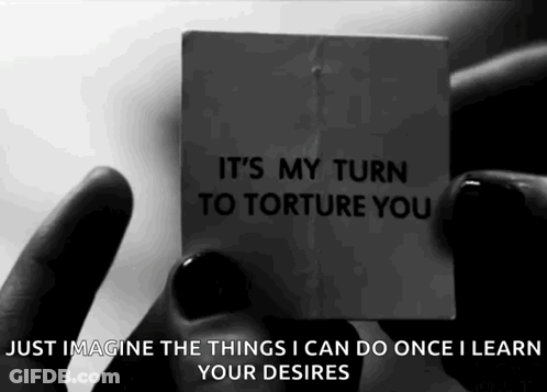 Black And White Photo Holding Paper Says It's My Turn To Torture You GIF