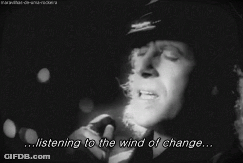 Black And White Photo Listening To The Wind Of Change GIF