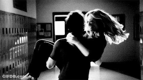 Black And White Photo Man Carrying Woman Hallway GIF