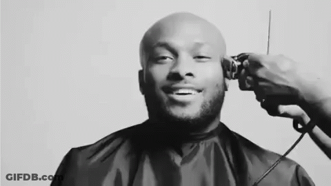 Black And White Photo Man Getting Haircut GIF