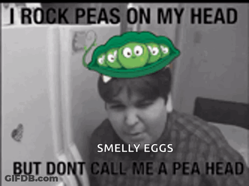 Black And White Photo Man With Peas On Head Saying I Rock Peas On My Head GIF