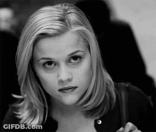 Black And White Photo Of Blonde Woman Looking At Camera GIF