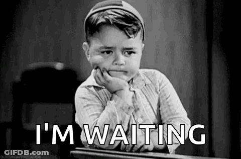 Black And White Photo Of Boy At Desk GIF