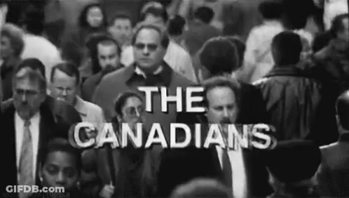 Black And White Photo Of Crowd With The Canadians GIF