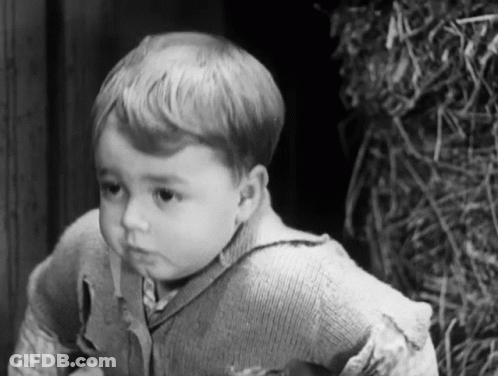 Black And White Photo Of Little Boy GIF