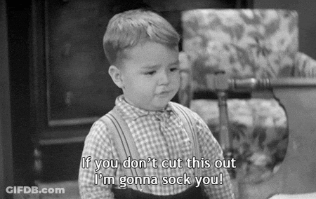 Black And White Photo Of Little Boy Saying If You Don't Cut This Out I'm Gonna Sock You GIF