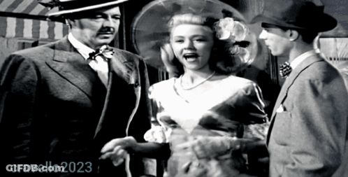 Black And White Photo Of Man And Woman 2023 GIF