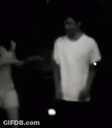 Black And White Photo Of Man And Woman Holding Hands GIF