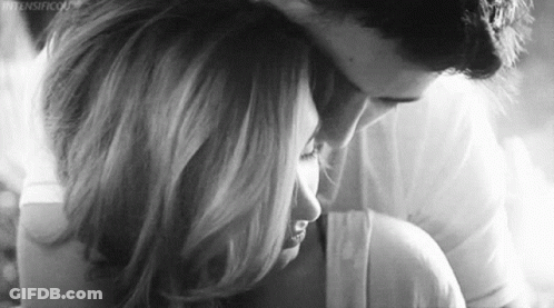 Black And White Photo Of Man And Woman Hugging GIF
