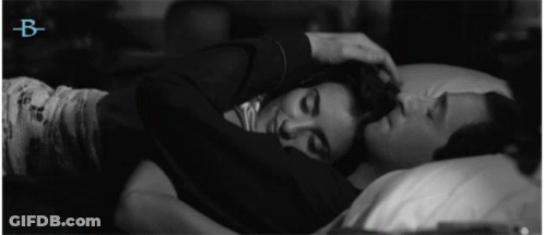 Black And White Photo Of Man And Woman Hugging With Letter B GIF