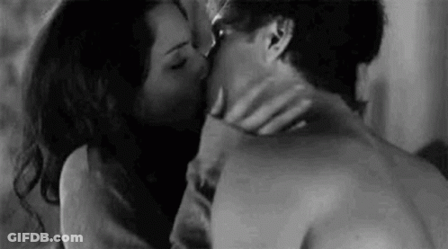 Black And White Photo Of Man And Woman Kissing GIF