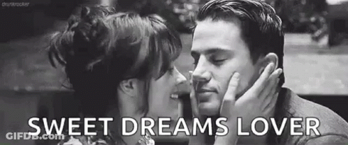Black And White Photo Of Man And Woman Kissing GIF