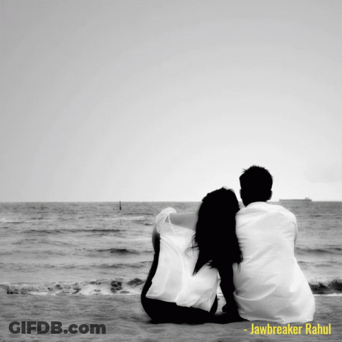 Black And White Photo Of Man And Woman On Beach Jawbreaker Rahul GIF