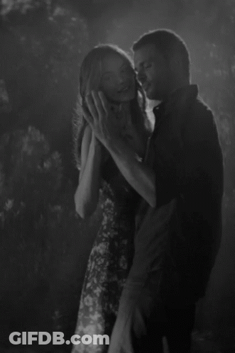 Black And White Photo Of Man And Woman Saying I Never Stopped Loving You GIF