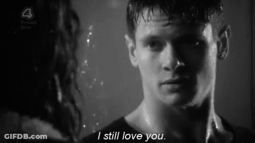 Black And White Photo Of Man And Woman Saying I Still Love You GIF