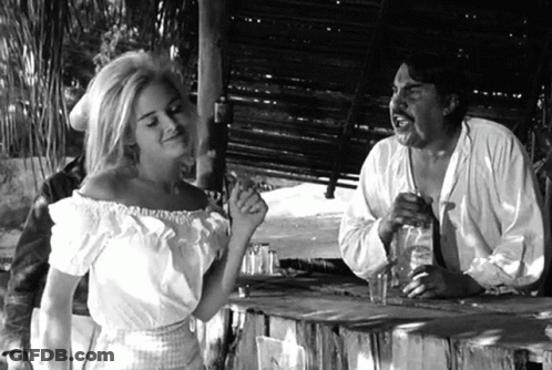 Black And White Photo Of Man And Woman Talking GIF
