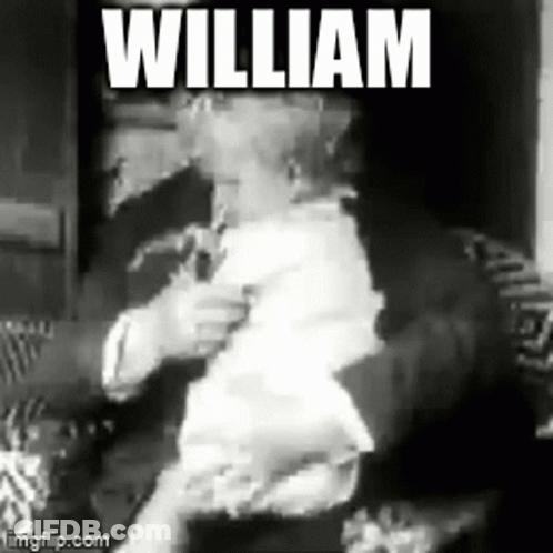 Black And White Photo Of Man Holding Baby William GIF
