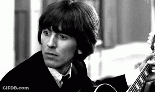 Black And White Photo Of Man Holding Guitar GIF