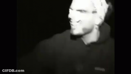 Black And White Photo Of Man In Beanie And Glasses GIF