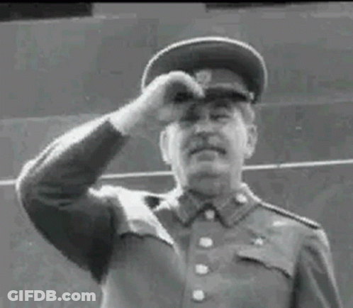 Black And White Photo Of Man In Military Uniform Waving GIF
