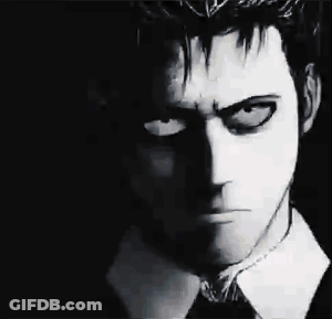 Black And White Photo Of Man In Suit GIF