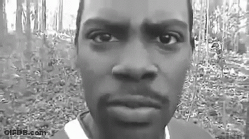 Black And White Photo Of Man's Face In Forest GIF