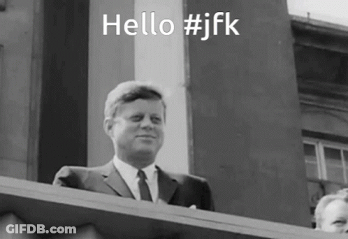 Black And White Photo Of Man Saying Hello #JFK GIF