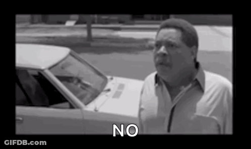 Black And White Photo Of Man Saying No In Front Of Car GIF