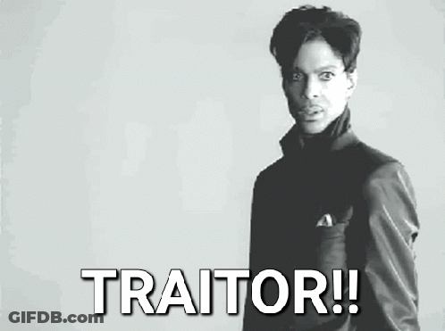 Black And White Photo Of Man Saying Traitor GIF