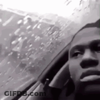 Black And White Photo Of Man Sitting In Car GIF