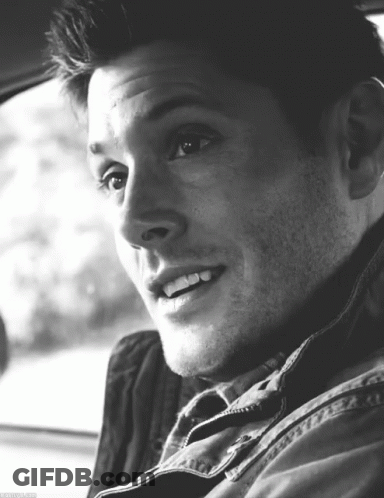 Black And White Photo Of Man Smiling In Car GIF