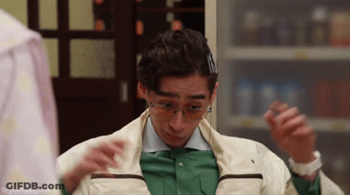 Black And White Photo Of Man Wearing Glasses GIF