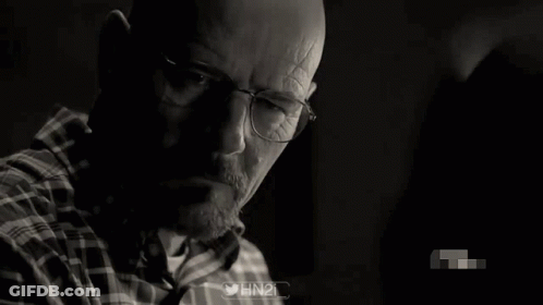 Black And White Photo Of Man Wearing Glasses GIF