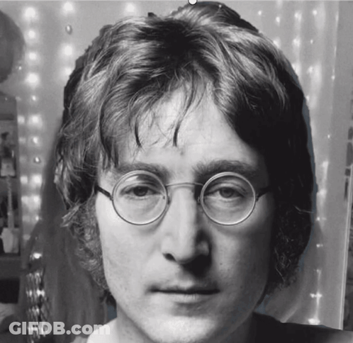 Black And White Photo Of Man With Glasses GIF