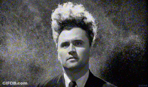 Black And White Photo Of Man With White Hair GIF