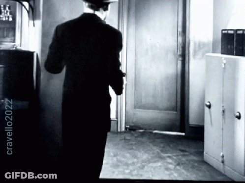 Black And White Photo Of Man With Year 2022 GIF