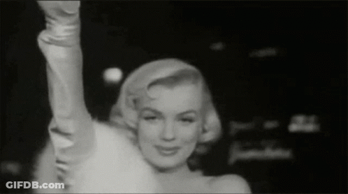 Black And White Photo Of Marilyn Monroe Smiling GIF