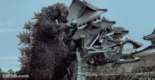 Black And White Photo Of Monster Destroying Castle GIF