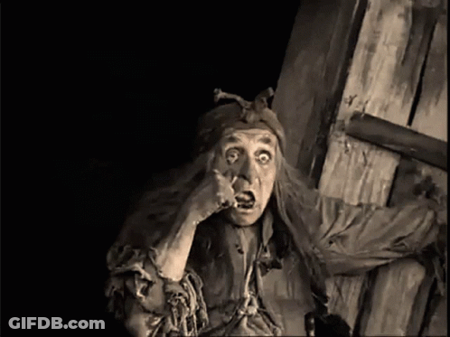 Black And White Photo Of Old Man With Scary Face GIF