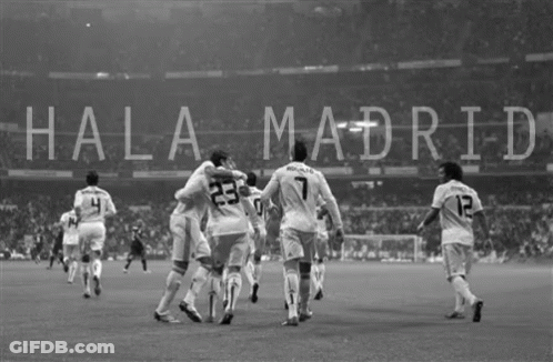 Black And White Photo Of People Holding Madrid Flags GIF