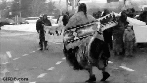 Black And White Photo Of People Holding Signs On Street GIF