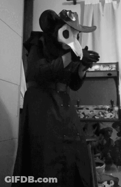 Black And White Photo Of Person In Costume GIF