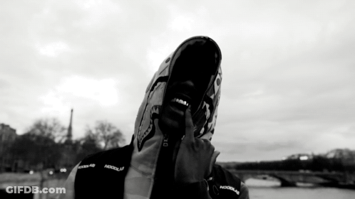 Black And White Photo Of Person In Hooded Jacket Saying Hood GIF