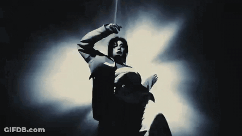 Black And White Photo Of Person In Suit GIF