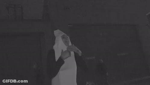 Black And White Photo Of Person In White Costume GIF