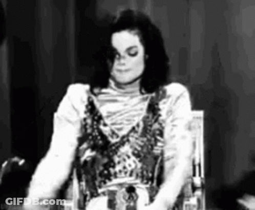 Black And White Photo Of Person Sitting In Chair GIF