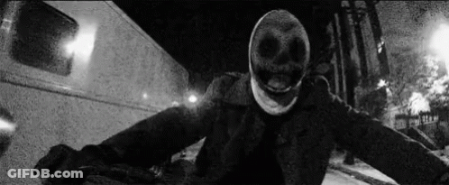Black And White Photo Of Person Wearing Skull Mask GIF
