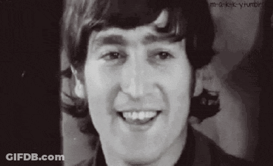 Black And White Photo Of Smiling Man GIF